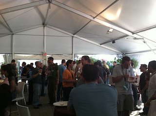 A photograph of a reception of nearly all men at the Mozilla summit.